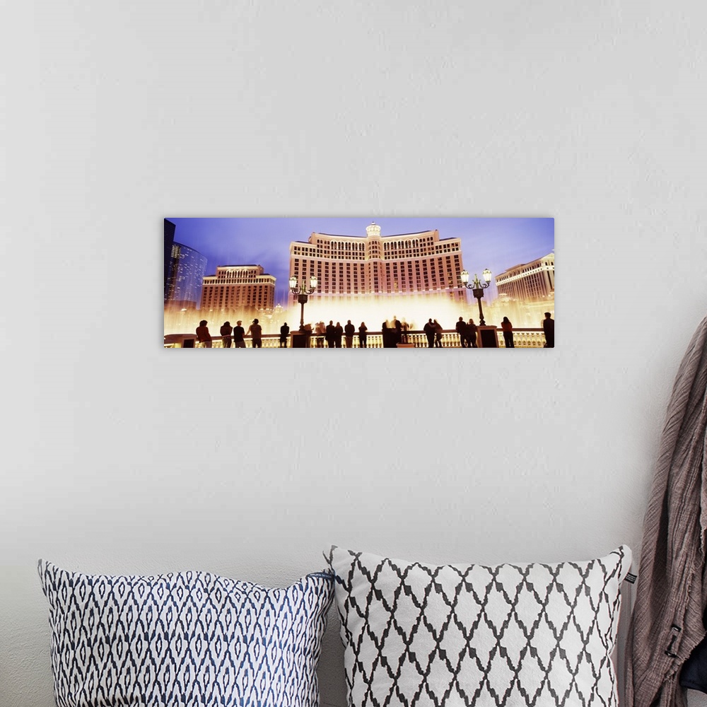 A bohemian room featuring Large horizontal panoramic photograph of the Bellagio Resort and Casino lit up on the Las Vegas, ...