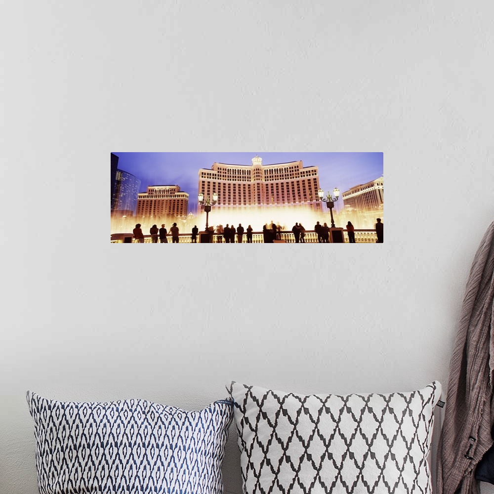 A bohemian room featuring Large horizontal panoramic photograph of the Bellagio Resort and Casino lit up on the Las Vegas, ...
