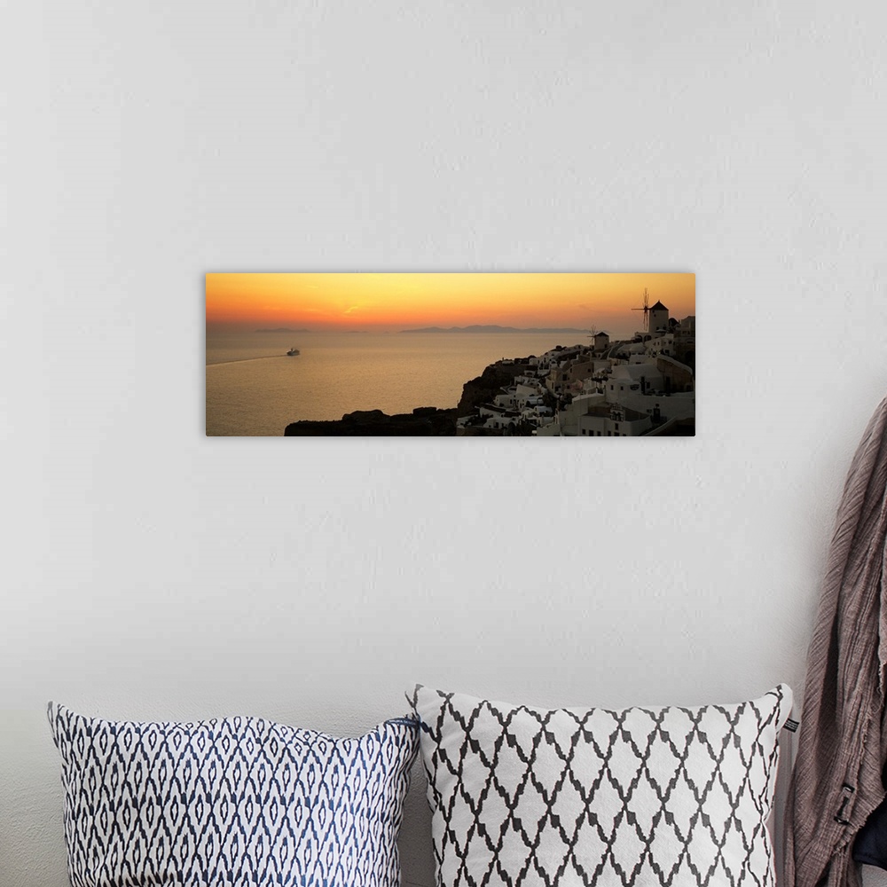 A bohemian room featuring Houses on a hill at dusk, Oia, Santorini, Cyclades Islands, Greece II