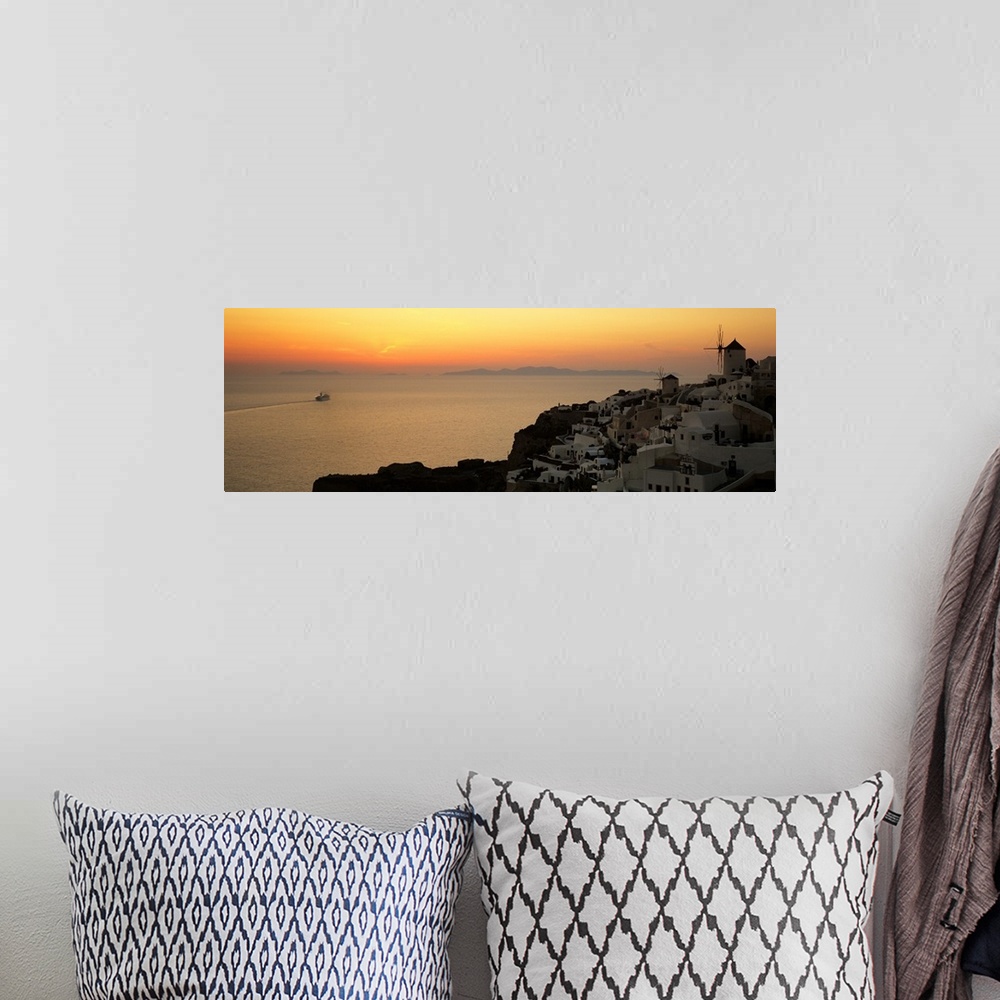 A bohemian room featuring Houses on a hill at dusk, Oia, Santorini, Cyclades Islands, Greece II