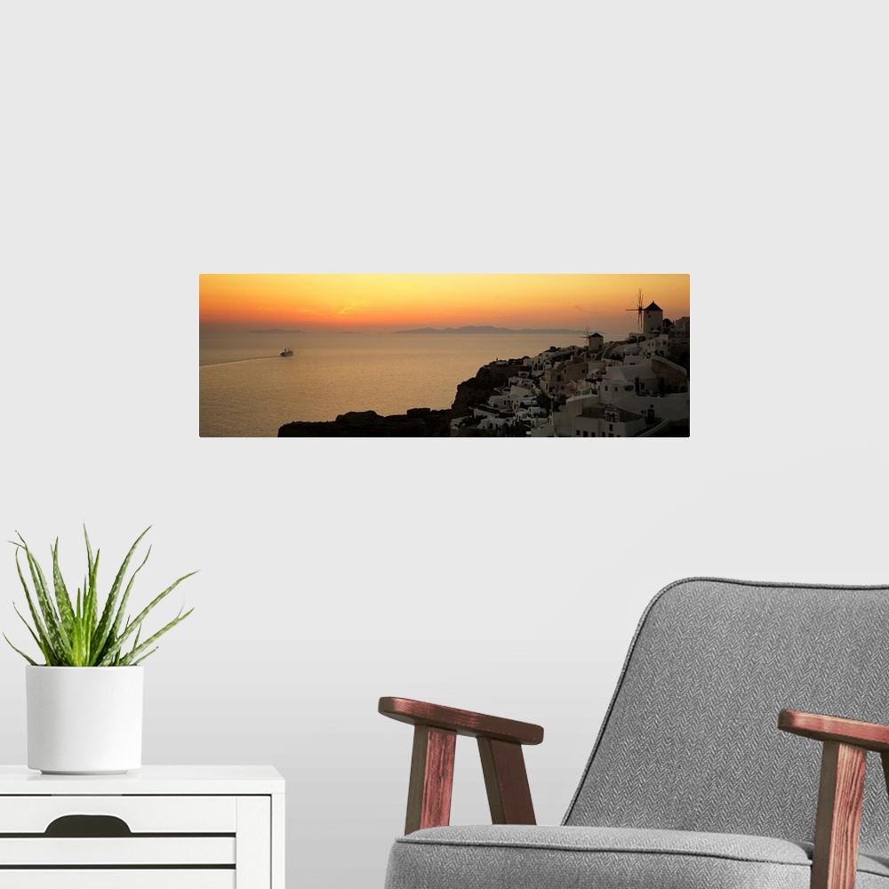 A modern room featuring Houses on a hill at dusk, Oia, Santorini, Cyclades Islands, Greece II