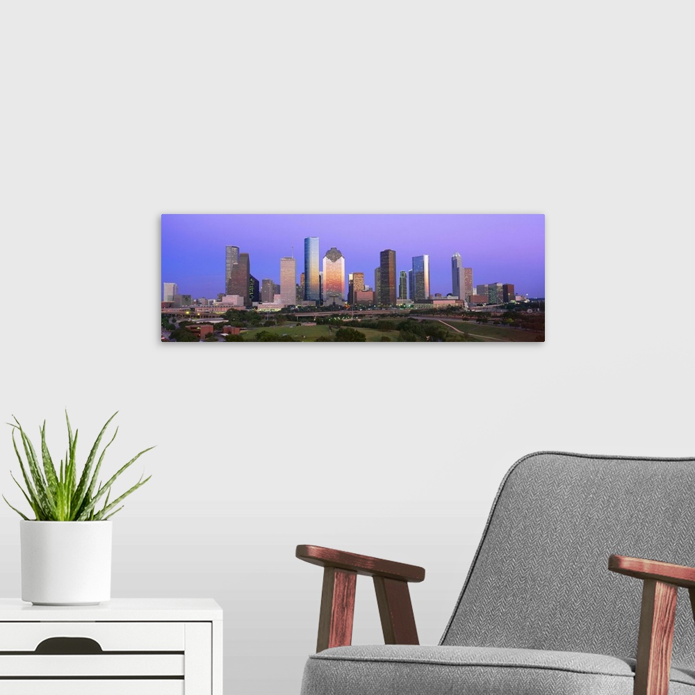 A modern room featuring Houston Skyline, Memorial Park, Dusk, Texas