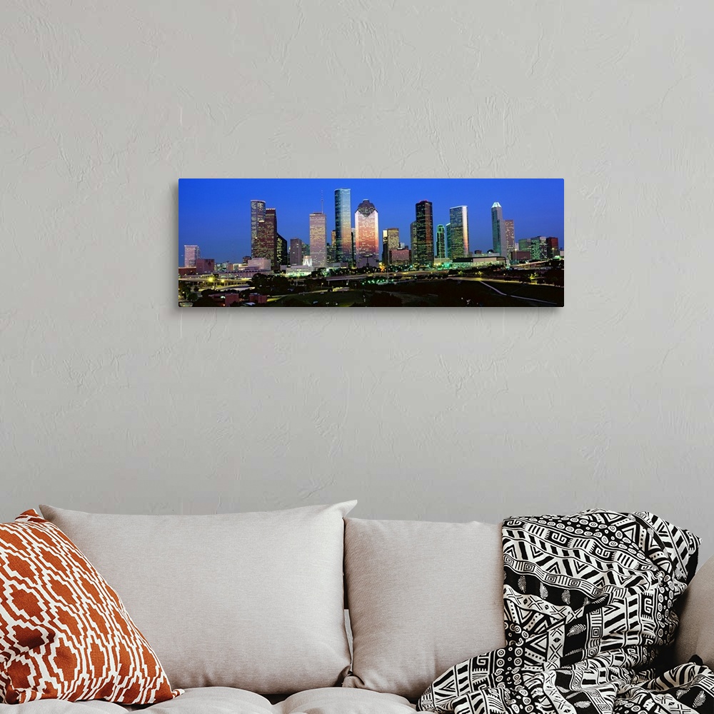 A bohemian room featuring Decorative artwork for the home or office this photograph captures the city skyline and surrounde...