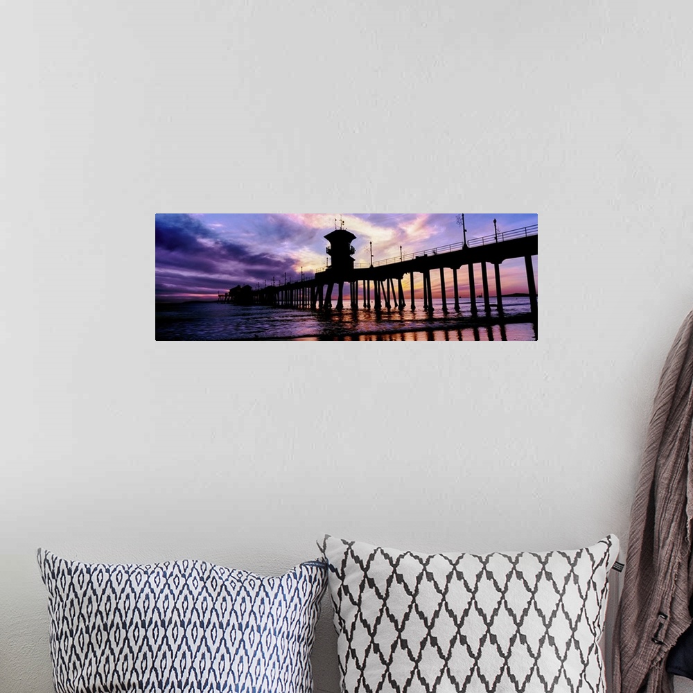 A bohemian room featuring Huntington Beach Pier at sunset, Huntington Beach, California, USA.