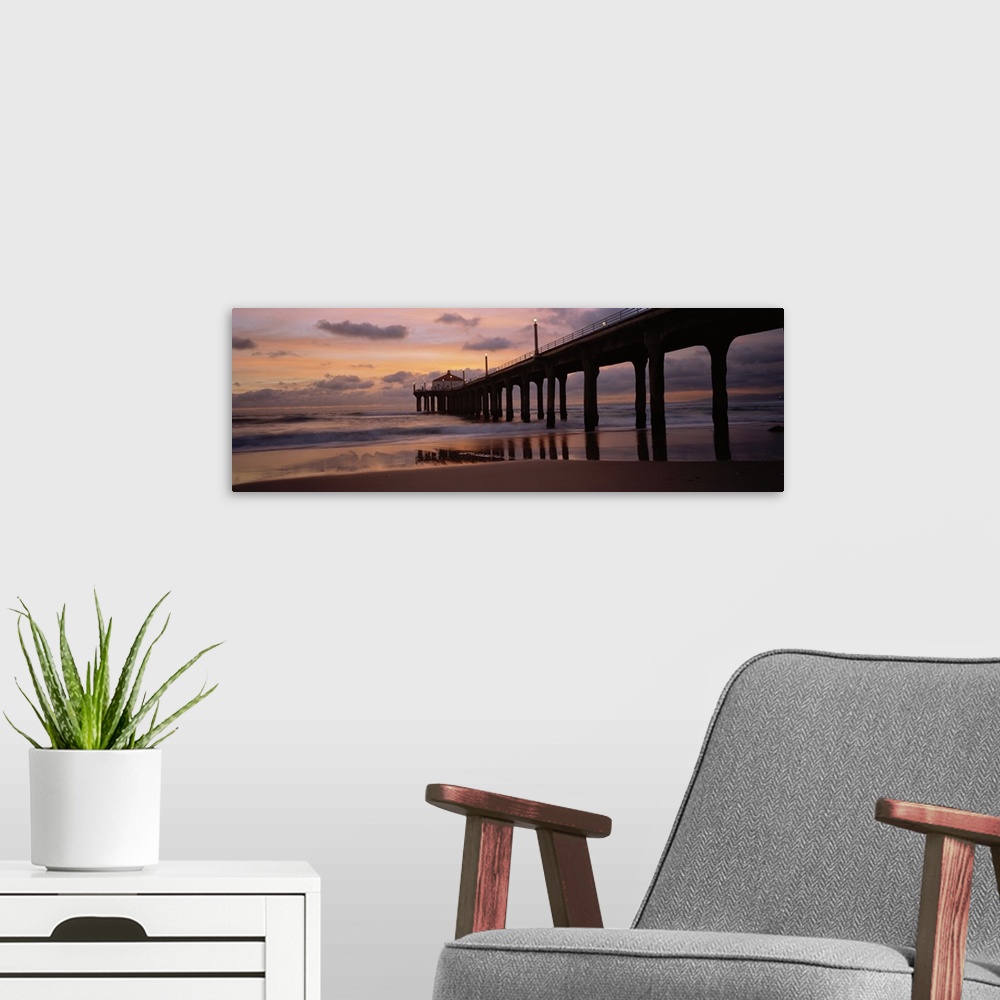 A modern room featuring Wide angle photograph of Manhattan Beach Pier extending into the water at sunset, in Los Angeles ...
