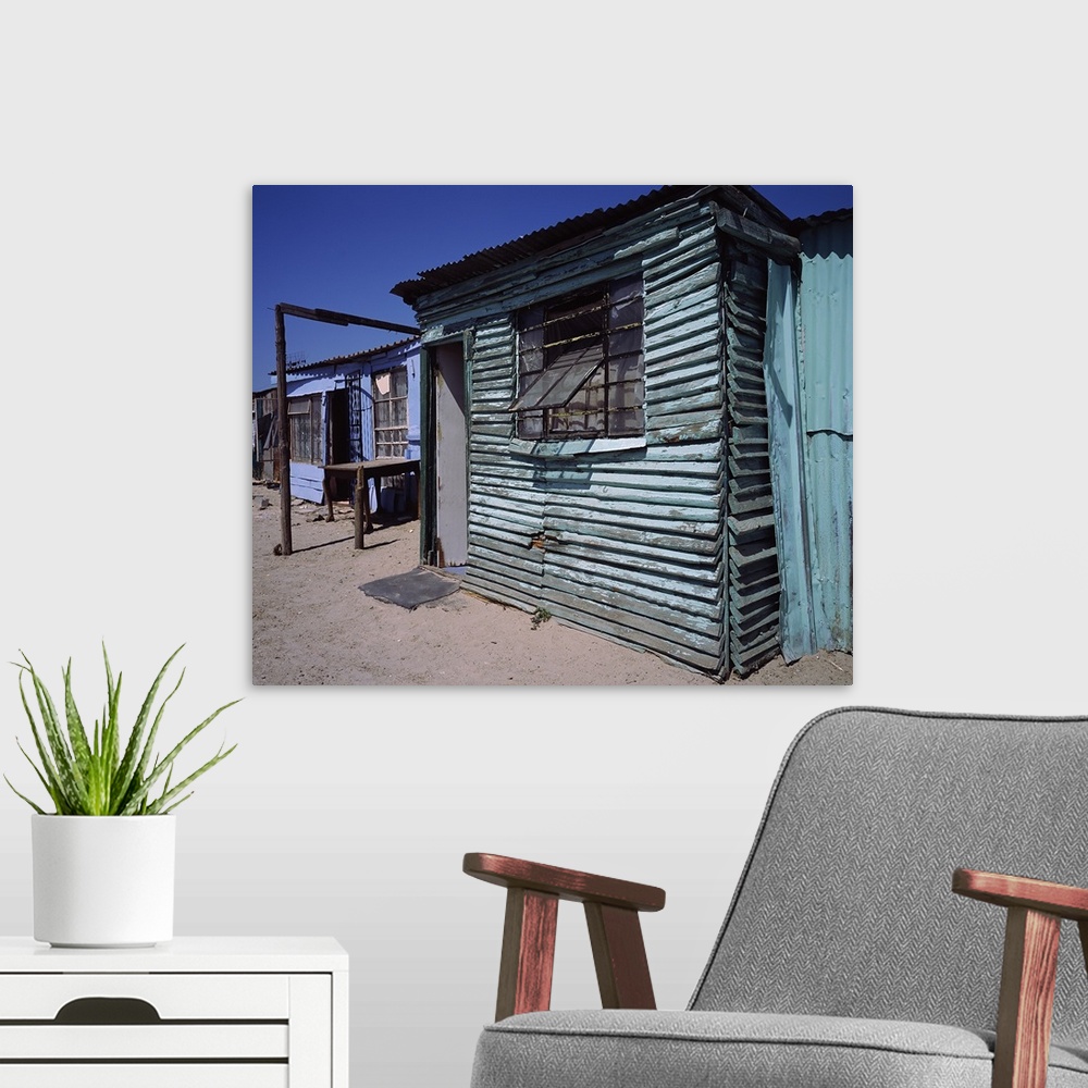 A modern room featuring Huts in a shanty town, Kibera, Nairobi, Kenya