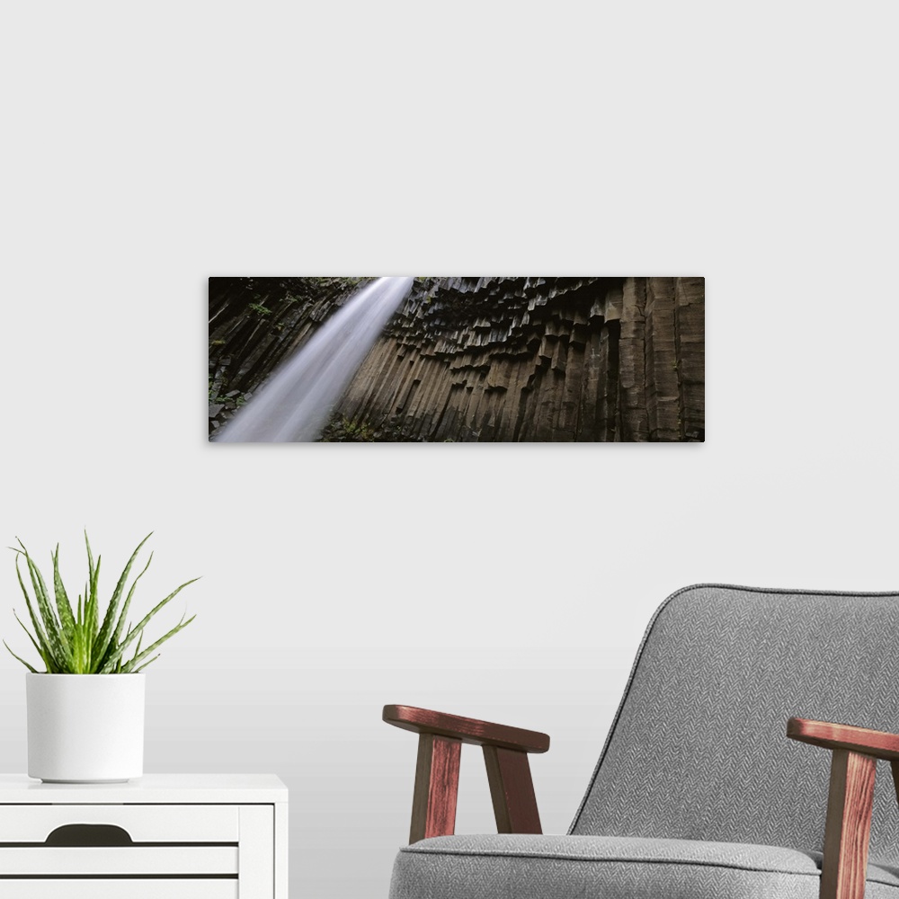 A modern room featuring Iceland, Skaftafell National Park, Svartifoss Waterfall, Water flowing from the cliff
