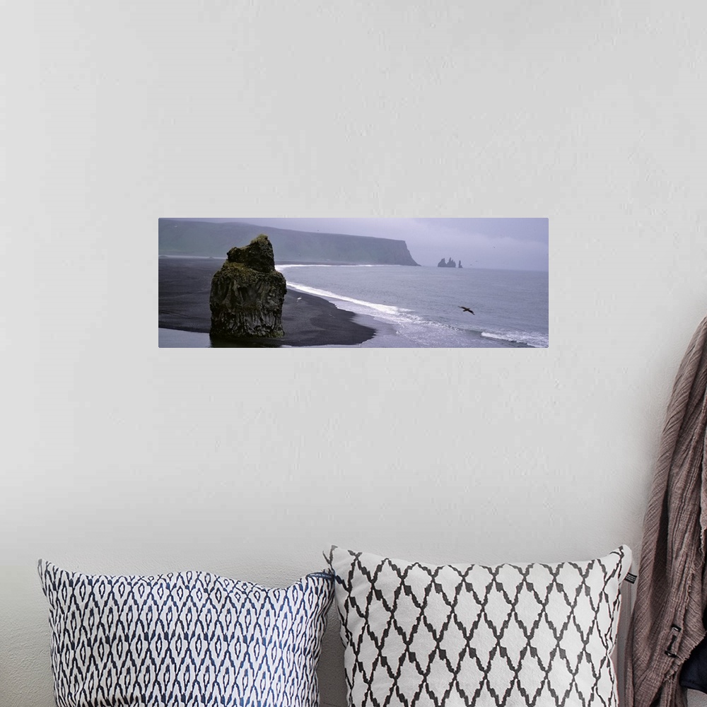 A bohemian room featuring Iceland, Vik I Myrdal, Reynisdrangar, Rock formation on the beach
