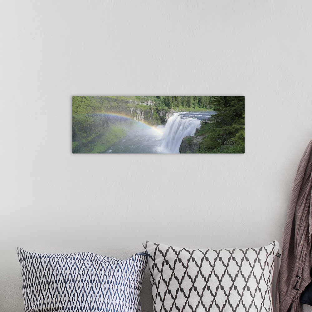 A bohemian room featuring Idaho, Targhee National Forest, Upper Mesa Falls, Aerial view of a rainbow over a waterfall