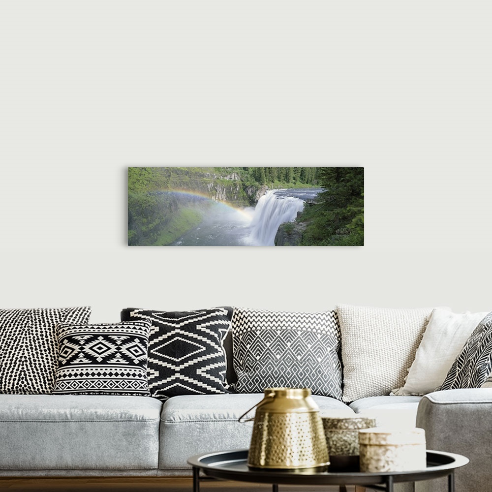 A bohemian room featuring Idaho, Targhee National Forest, Upper Mesa Falls, Aerial view of a rainbow over a waterfall
