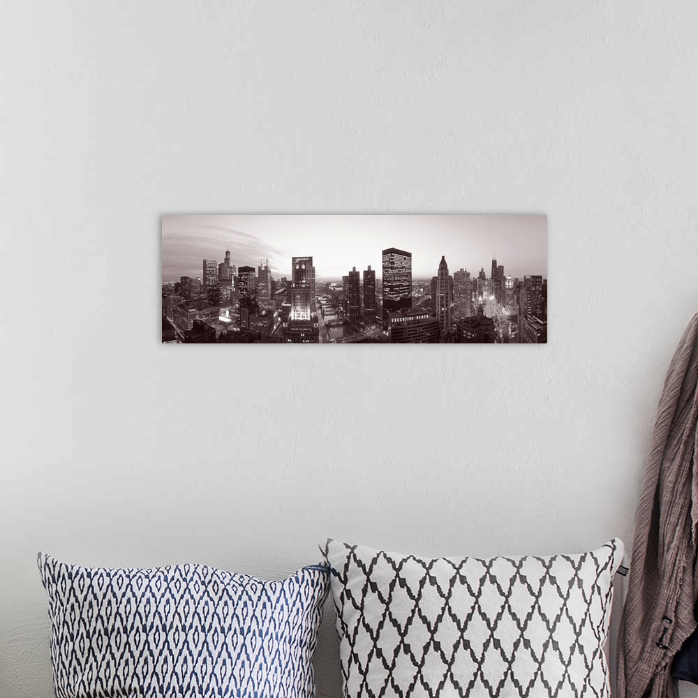 A bohemian room featuring This wide angle panoramic photograph shows this Midwestern city skyline in a monochromatic tint.