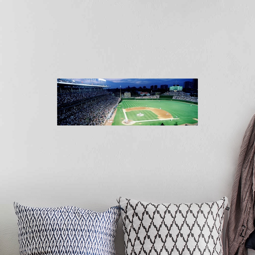 A bohemian room featuring Panoramic photograph taken from the top section behind home plate overlooking historic Wrigley Fi...