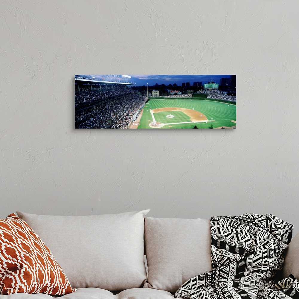 A bohemian room featuring Panoramic photograph taken from the top section behind home plate overlooking historic Wrigley Fi...