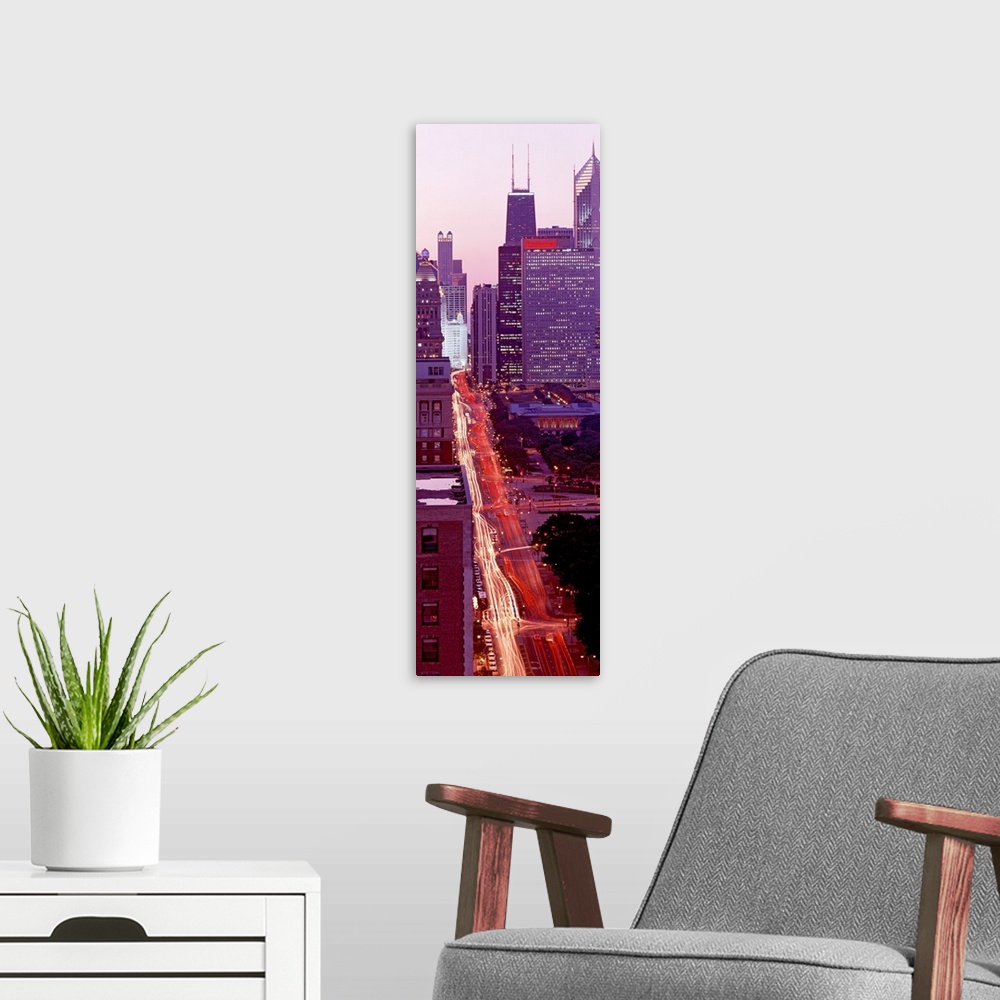 A modern room featuring Illinois, Chicago, One Magnificent Mile, High angle view of an urban road at dusk