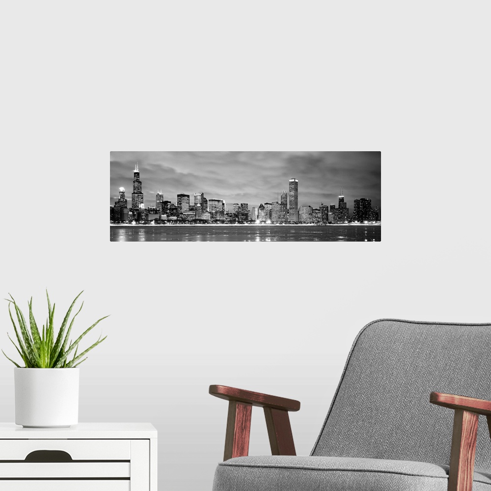 A modern room featuring Black and White panoramic photograph showing the view from Lake Michigan in winter of the Chicago...