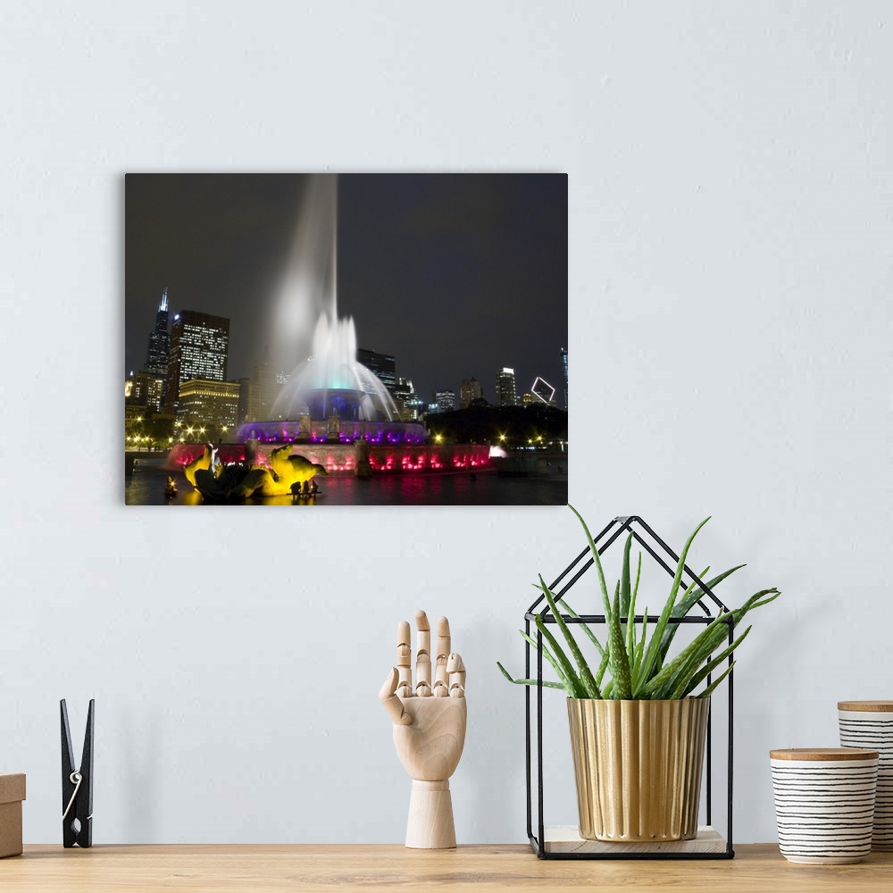 A bohemian room featuring Illuminated fountain with skyscrapers in a city, Buckingham Fountain, Grant Park, Chicago, Illinois,