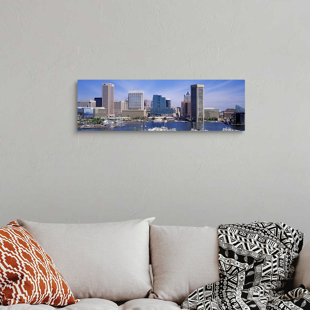 A bohemian room featuring Panoramic image of the harbor area of downtown Baltimore, Maryland with sailboats and yachts park...