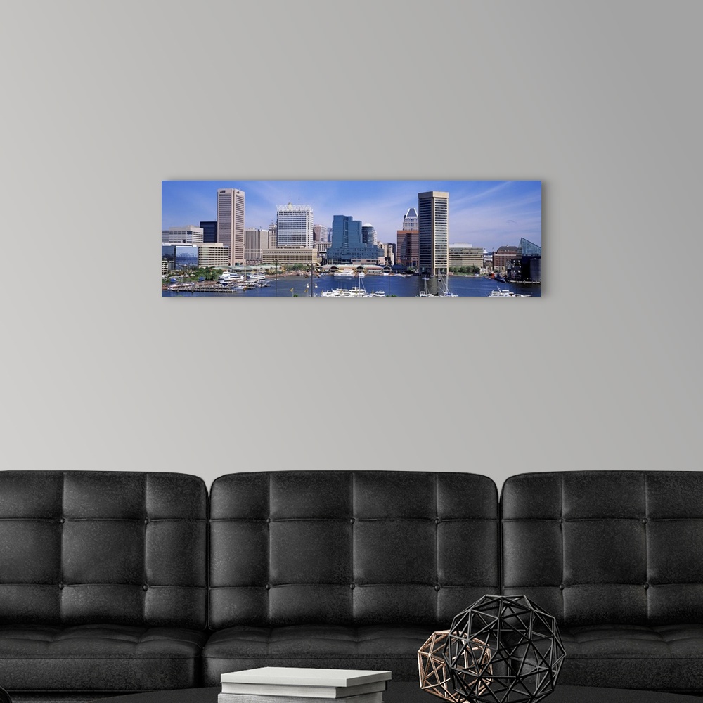 A modern room featuring Panoramic image of the harbor area of downtown Baltimore, Maryland with sailboats and yachts park...