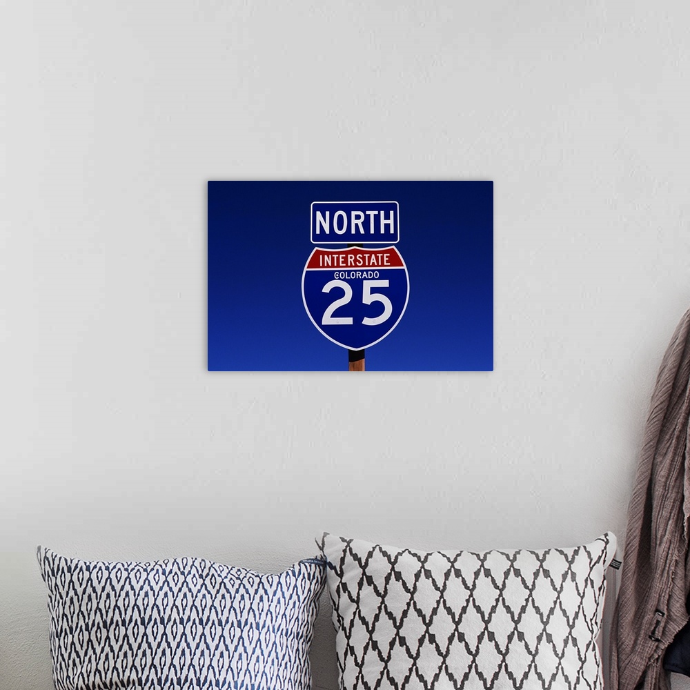 A bohemian room featuring Interstate 25 North Road Sign