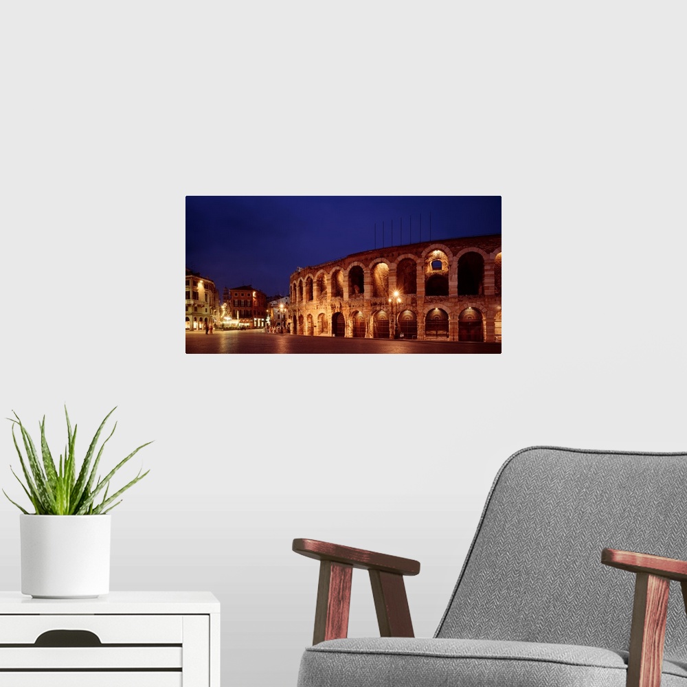 A modern room featuring Italy, Verona, The Arena, evening