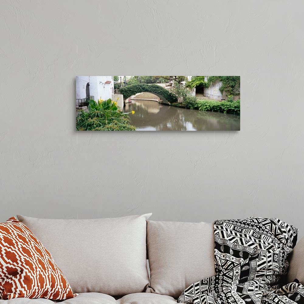 A bohemian room featuring Ivy covering a foot bridge, San Antonio River, San Antonio River Walk, San Antonio, Texas