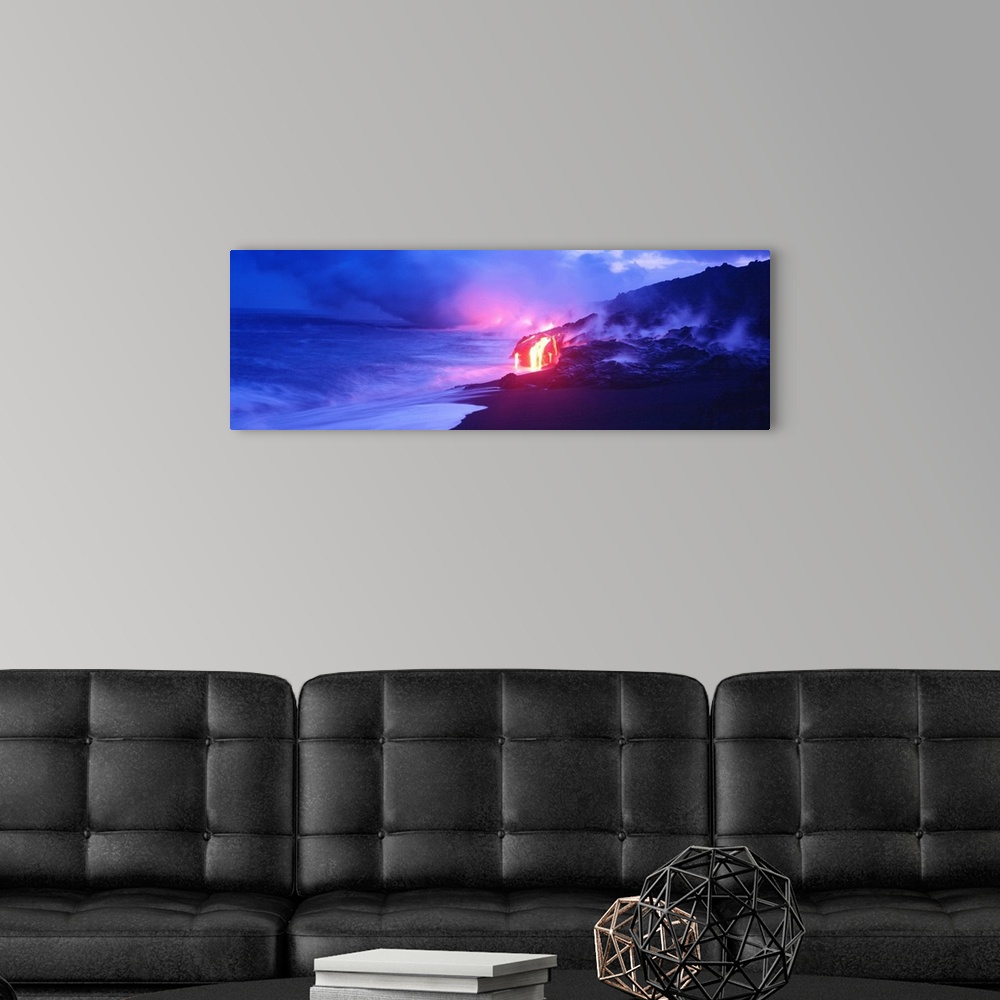 A modern room featuring This panoramic photograph was taken at twilight and focuses on the glowing magma as it meets the ...
