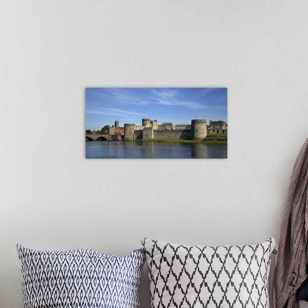 A bohemian room featuring King Johns Castle, River Shannon, Limerick City, Ireland
