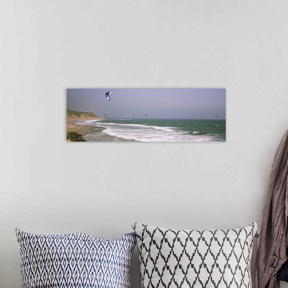 A bohemian room featuring Kite surfers over the sea, Waddell Beach, Waddell Creek, Santa Cruz County, California