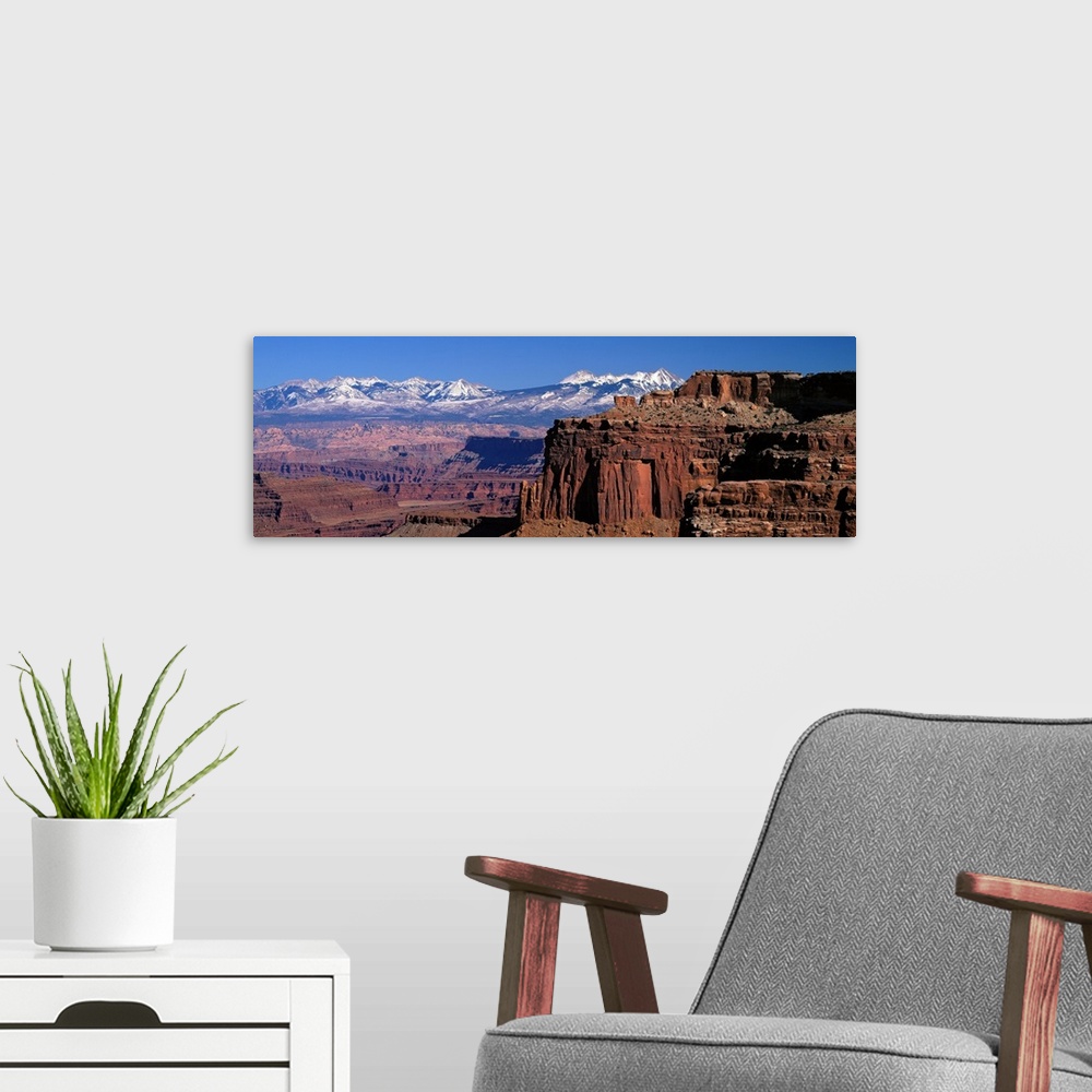 A modern room featuring La Sal Mountains seen from Canyonlands National Park Utah