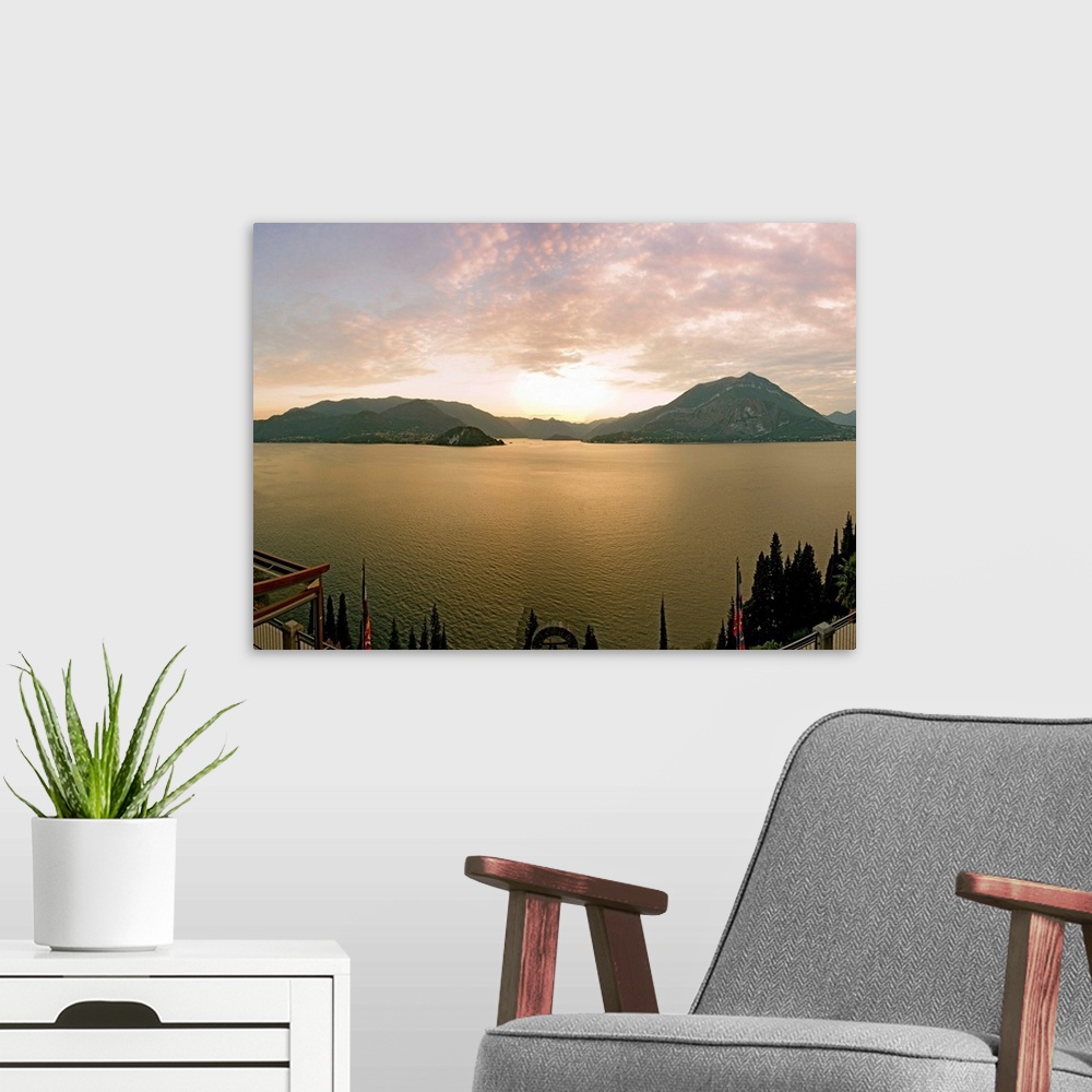 A modern room featuring Lake Como at sunset seen from Varenna, Bellagio, Lombardy, Italy
