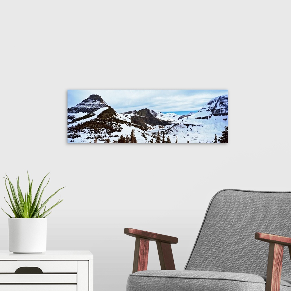 A modern room featuring Lake flowing through mountains in winter, Hidden Lake, US Glacier National Park, Montana