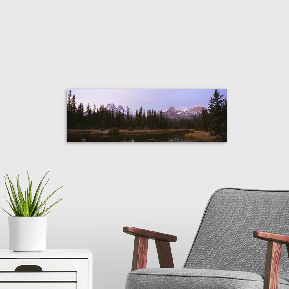 A modern room featuring Lake in a forest, Three Sisters Mountain, Mt Lawrence Grassi, Bow Valley, Canmore, Alberta, Canada