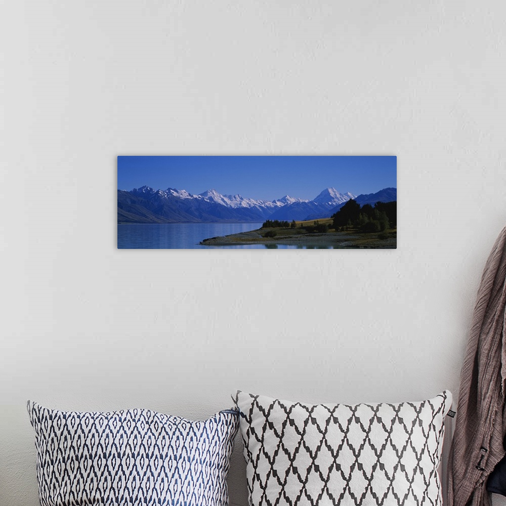 A bohemian room featuring Lake in front of a mountain range, Lake Pukaki, Mt Cook, Southern Alps, New Zealand