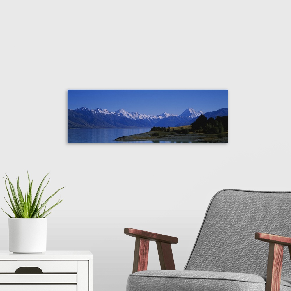 A modern room featuring Lake in front of a mountain range, Lake Pukaki, Mt Cook, Southern Alps, New Zealand