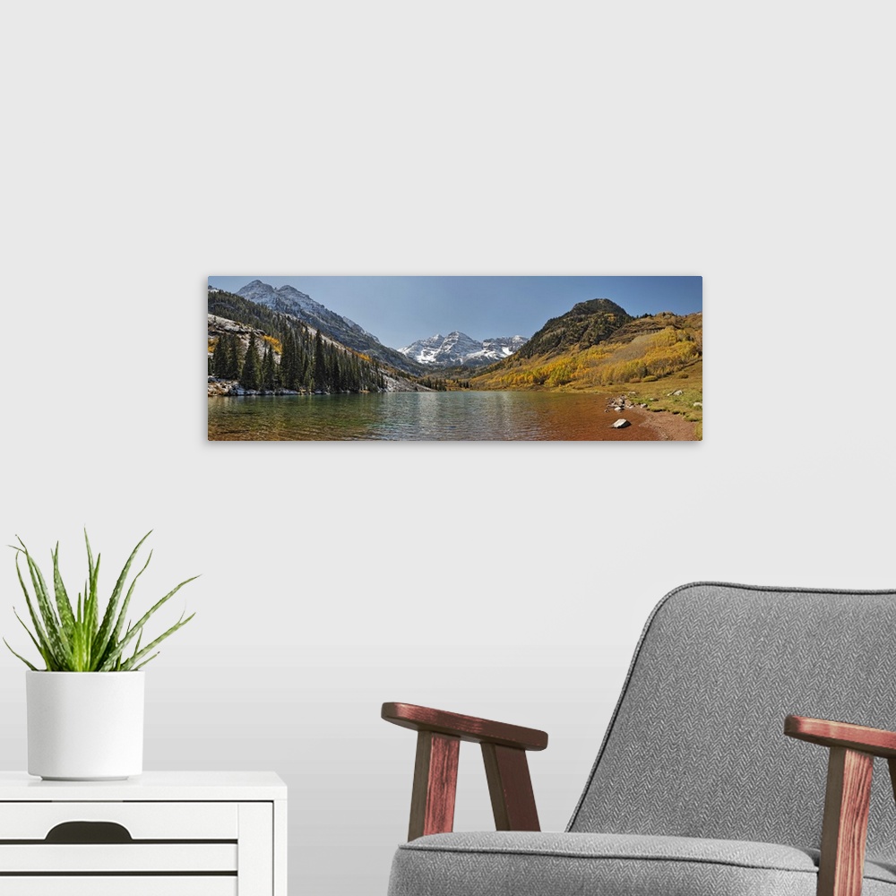 A modern room featuring Image taken from the edge of a lake in a valley in the Rocky Mountains, surrounded by tall pine t...