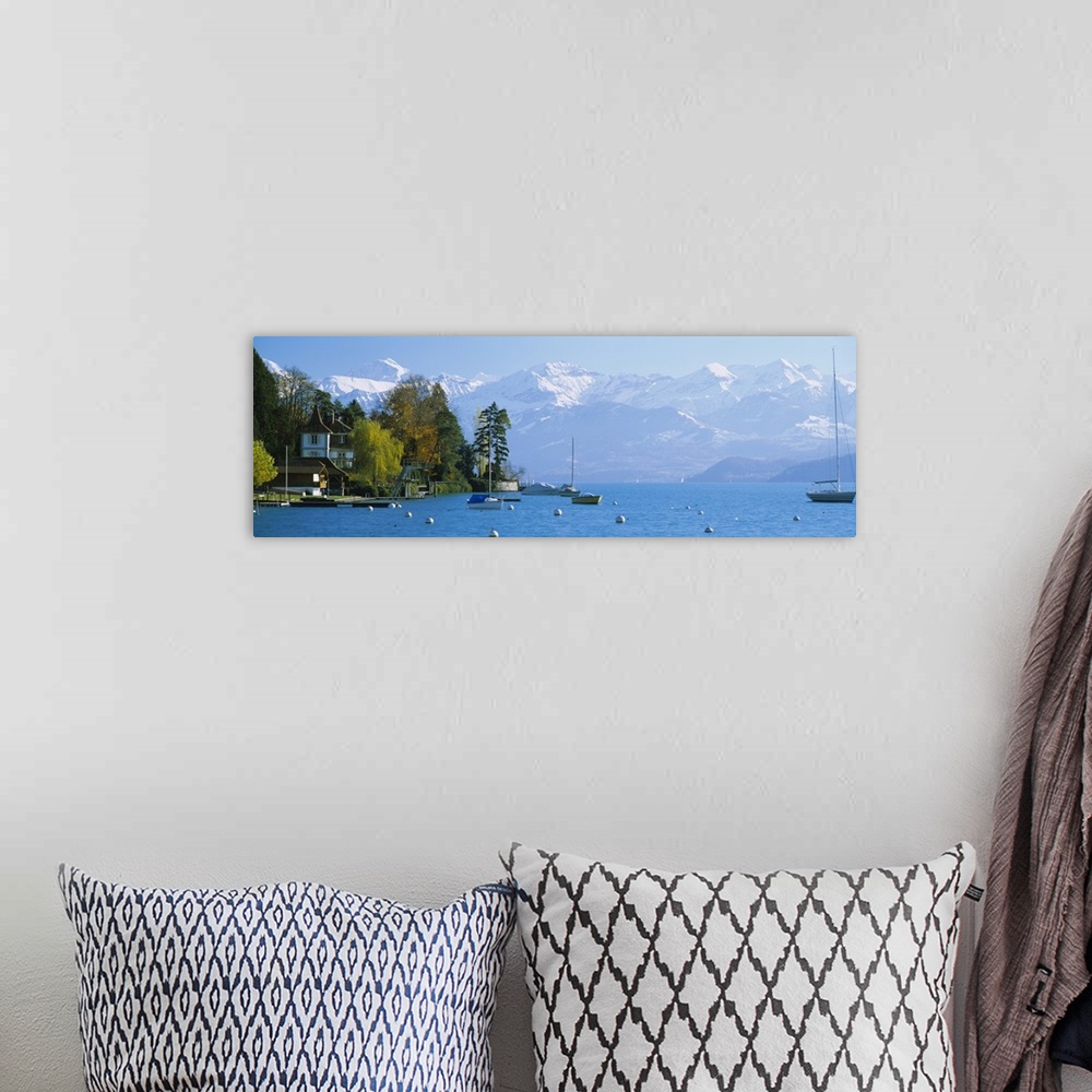 A bohemian room featuring Lake Thun by Hilterfingen Canton Bern Switzerland