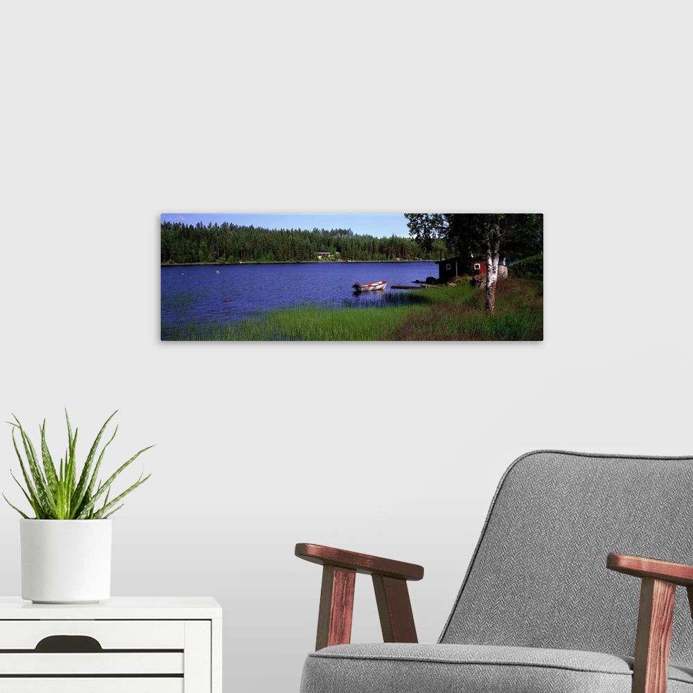 A modern room featuring Lake with Cabin and Boat, near Falun, Dalarna, Sweden
