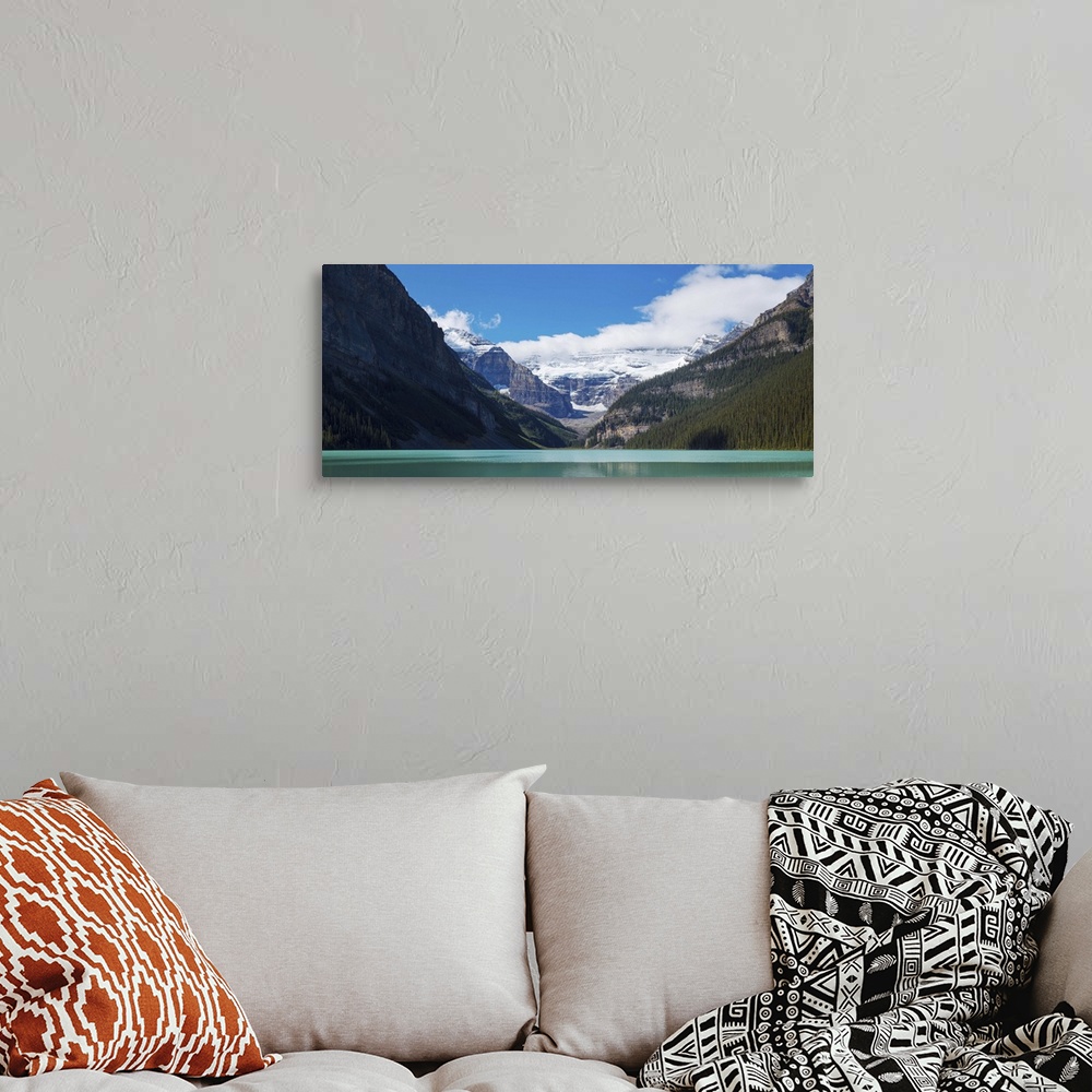 A bohemian room featuring Lake with Canadian Rockies in the background, Lake Louise, Canada