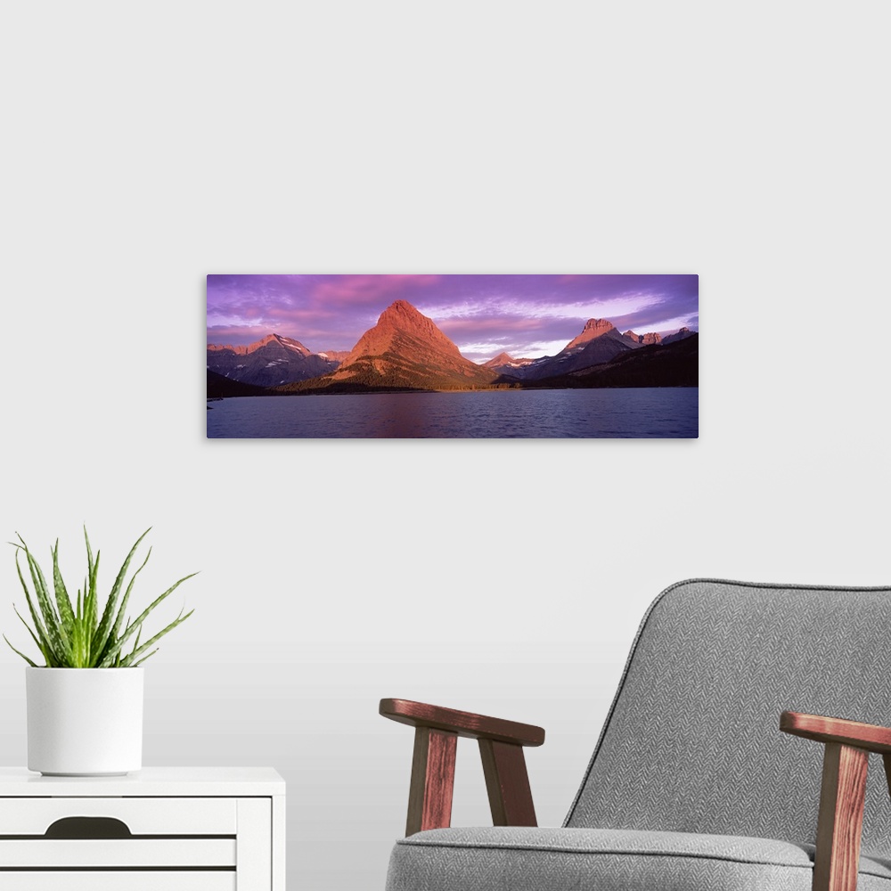 A modern room featuring Lake with mountains at dusk, Swiftcurrent Lake, Many Glacier, US Glacier National Park, Montana,