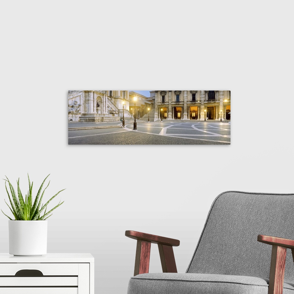 A modern room featuring Lampposts lit up at a town square, Piazza del Campidoglio, Rome, Lazio, Italy
