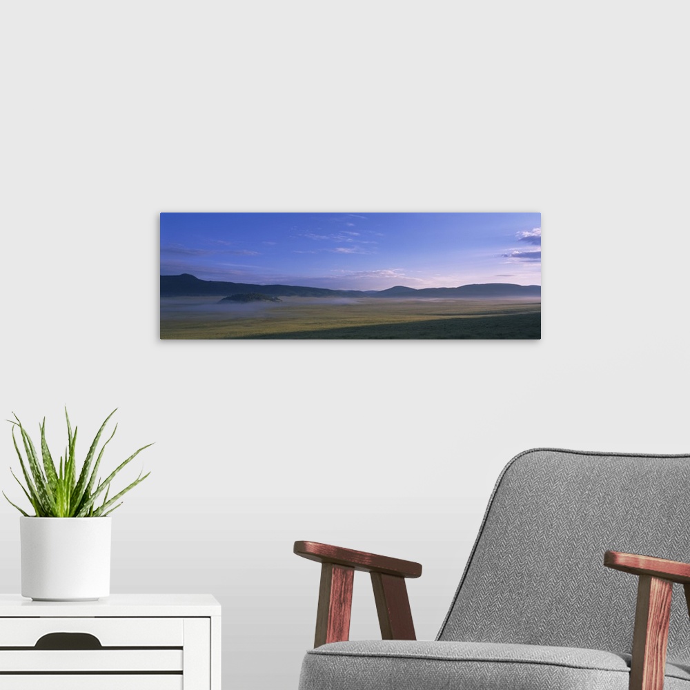 A modern room featuring Landscape with mountains in the background, Valle Grande, Valles Caldera National Preserve, Redon...