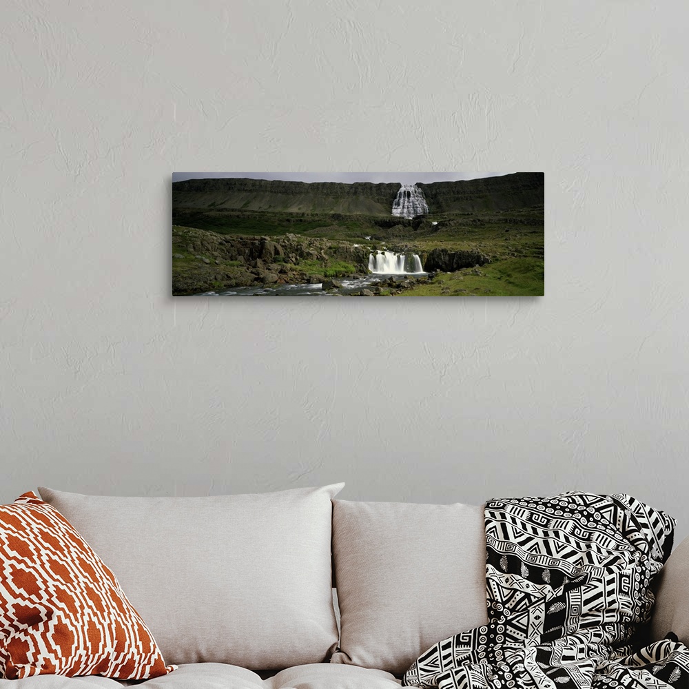 A bohemian room featuring Landscape with waterfall and stream, Iceland