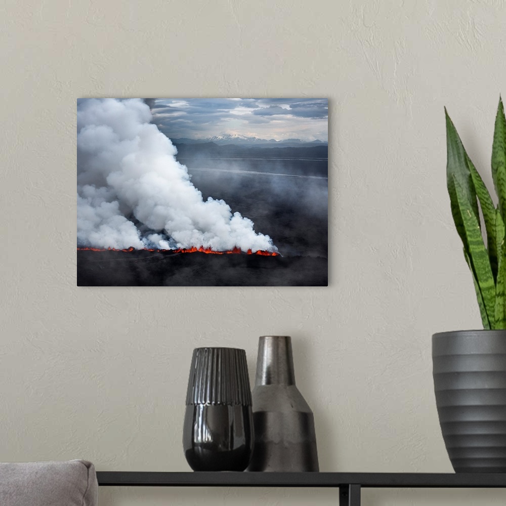A modern room featuring Lava and plumes from the Holuhraun Fissure by the Bardarbunga Volcano, Iceland. Sept. 1, 2014