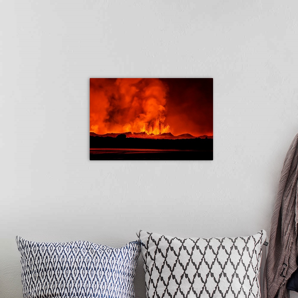 A bohemian room featuring Lava fountains at night, eruption at the Holuhraun Fissure, near the Bardarbunga Volcano, Iceland
