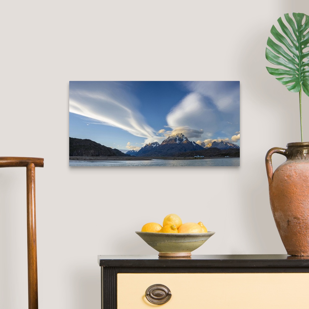 A traditional room featuring Lenticular clouds over mountain peaks, Grey Lake, Torres Del Paine National Park, Chile.