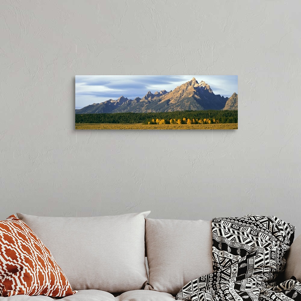 A bohemian room featuring Lenticular clouds over mountain range, Grand Teton National Park, Wyoming, USA.