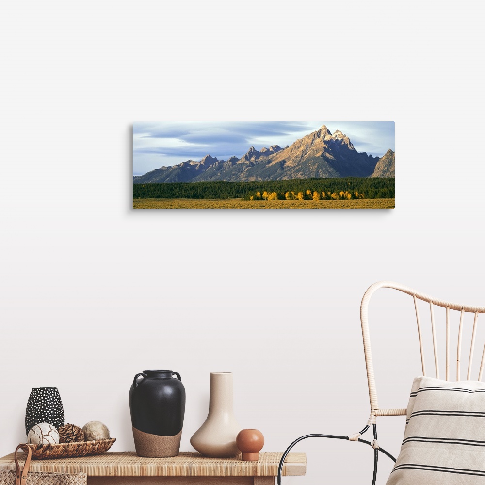A farmhouse room featuring Lenticular clouds over mountain range, Grand Teton National Park, Wyoming, USA.
