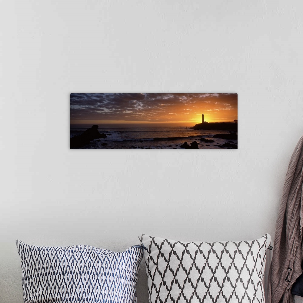 A bohemian room featuring Sunset behind Pigeon Point lighthouse, California