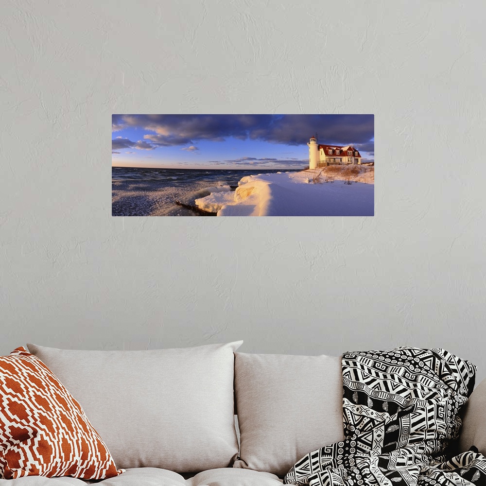A bohemian room featuring Panoramic photograph taken of a snow-covered beach on the edge of a large lake within the Midwest...