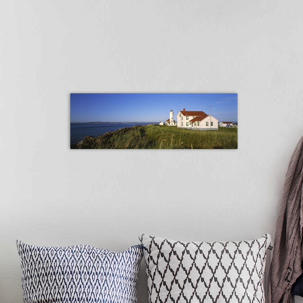 A bohemian room featuring Lighthouse on a landscape, Ft. Worden Lighthouse, Port Townsend, Washington State
